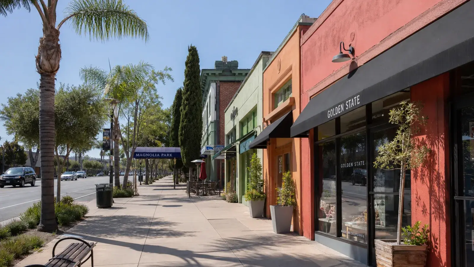 Magnolia Park Burbank sidewalk palms and storefronts — breast augmentation lifestyle | SurgiSculpt®