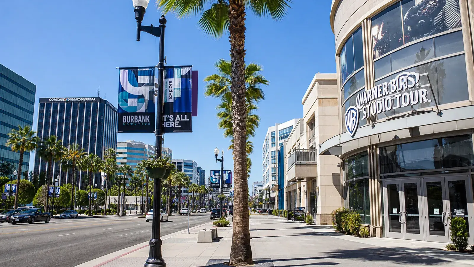 Downtown Burbank walkable streetscape with palms — HD liposuction city context | SurgiSculpt®