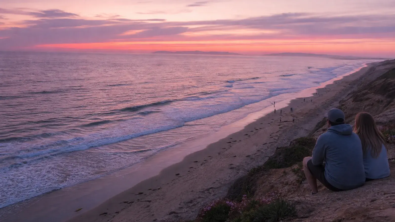 Pacific vista from Huntington Beach bluffs at soft dusk — breast augmentation context | SurgiSculpt®
