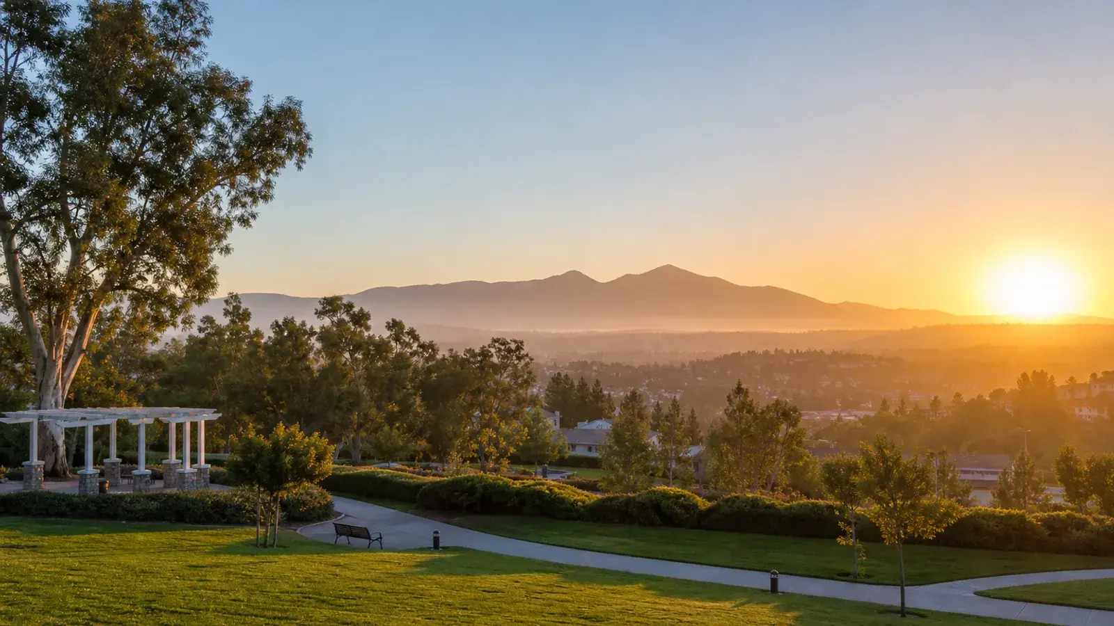 Mission Viejo park lawns with Saddleback views at sunrise — tummy tuck lifestyle | SurgiSculpt®
