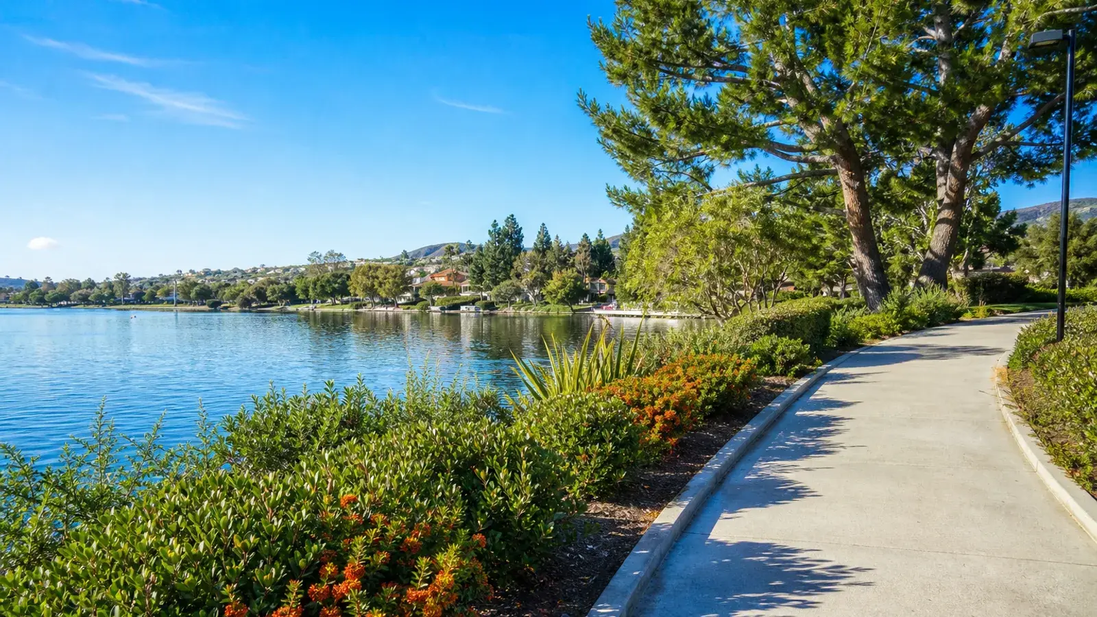 Lake Mission Viejo outdoor recreation path with greenery — tummy tuck wellness | SurgiSculpt®