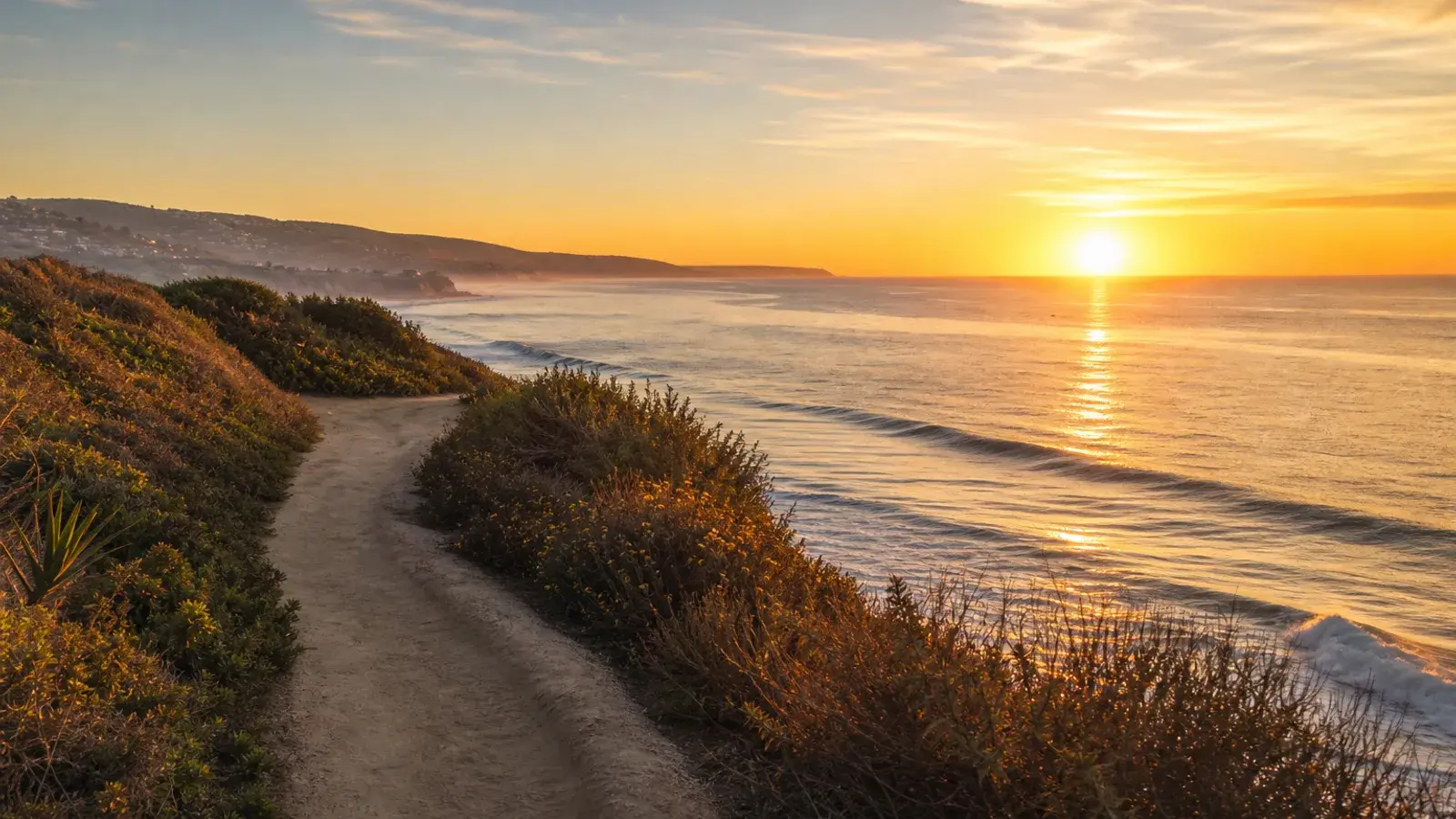 Newport Beach oceanfront bluff path at sunrise — tummy tuck wellness lifestyle | SurgiSculpt®
