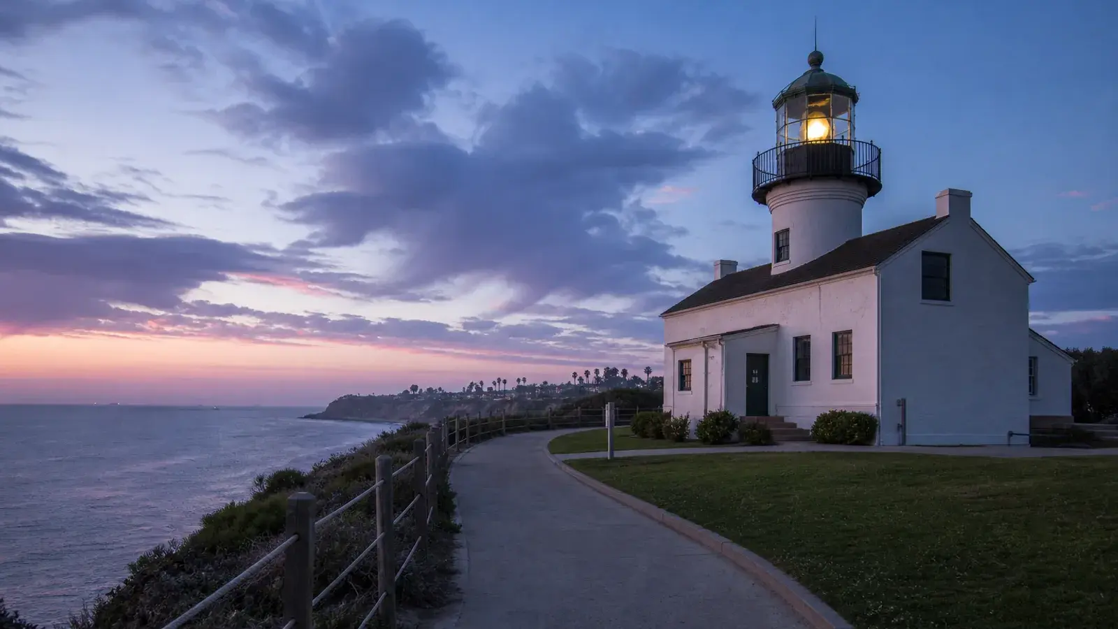Point Fermin lighthouse exterior coastal path at blue hour — mommy makeover mood | SurgiSculpt®