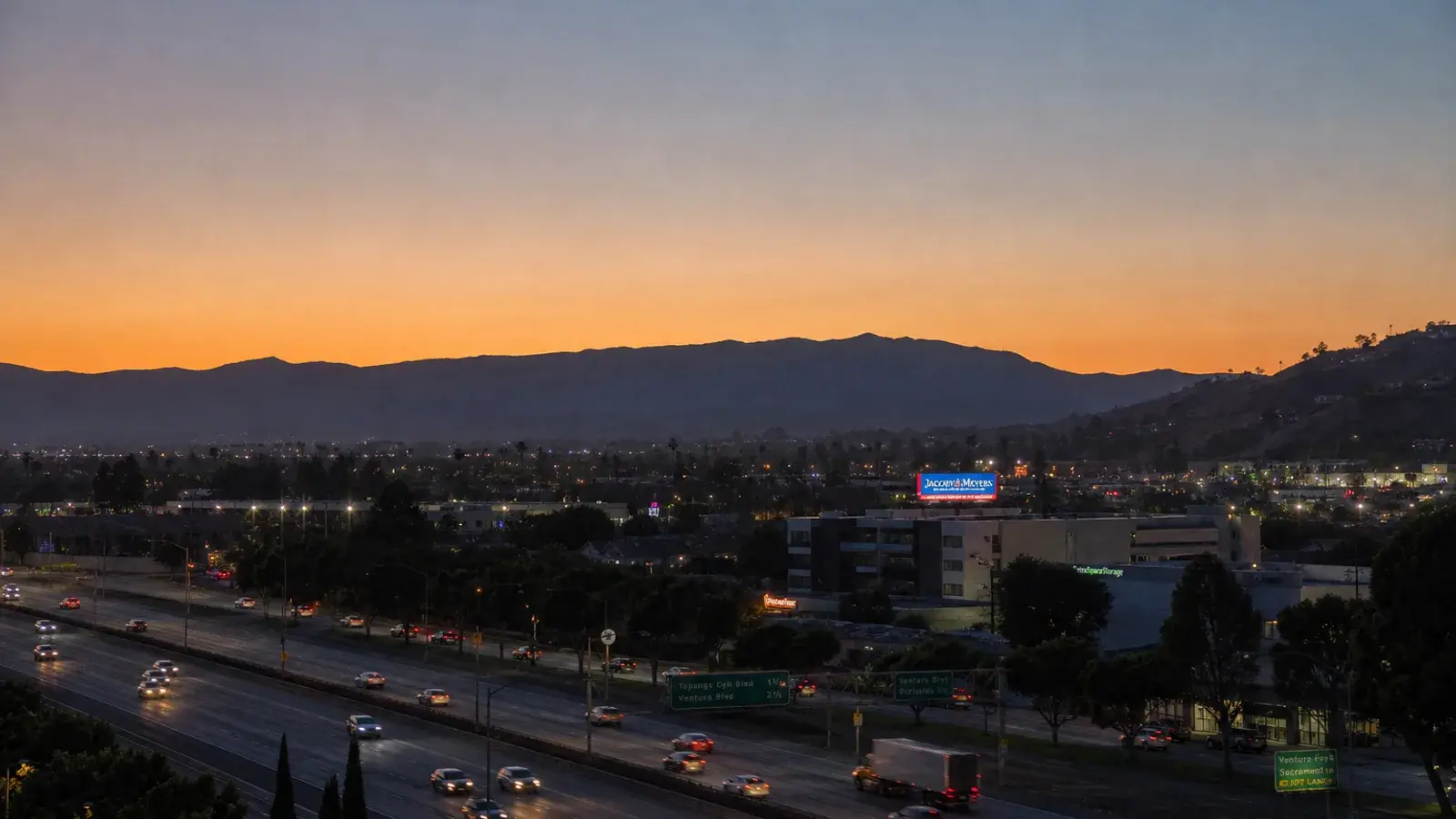 Ventura Freeway corridor exteriors Woodland Hills blue hour — discreet gynecomastia logistics | SurgiSculpt®