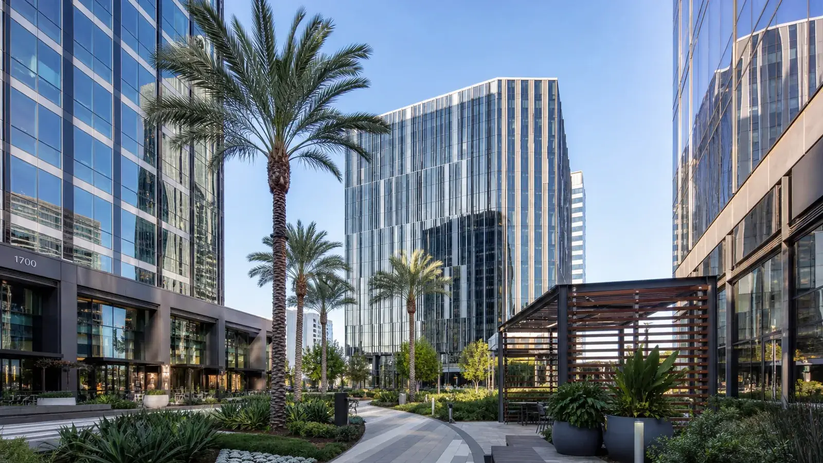 Platinum Triangle modern exterior towers and landscaped walk at afternoon sun — BBL lifestyle Platinum Triangle modern exterior towers and landscaped walk at afternoon sun — BBL lifestyle | SurgiSculpt®