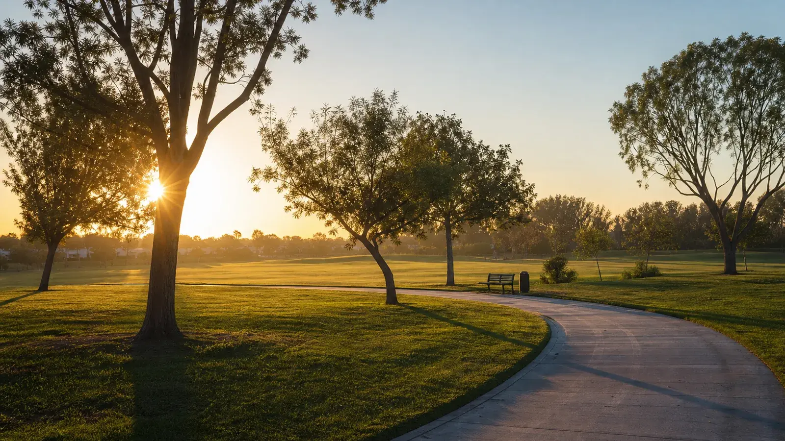 Anaheim neighborhood park lawns and walking path at sunrise — tummy tuck lifestyle Anaheim neighborhood park lawns and walking path at sunrise — tummy tuck lifestyle | SurgiSculpt®