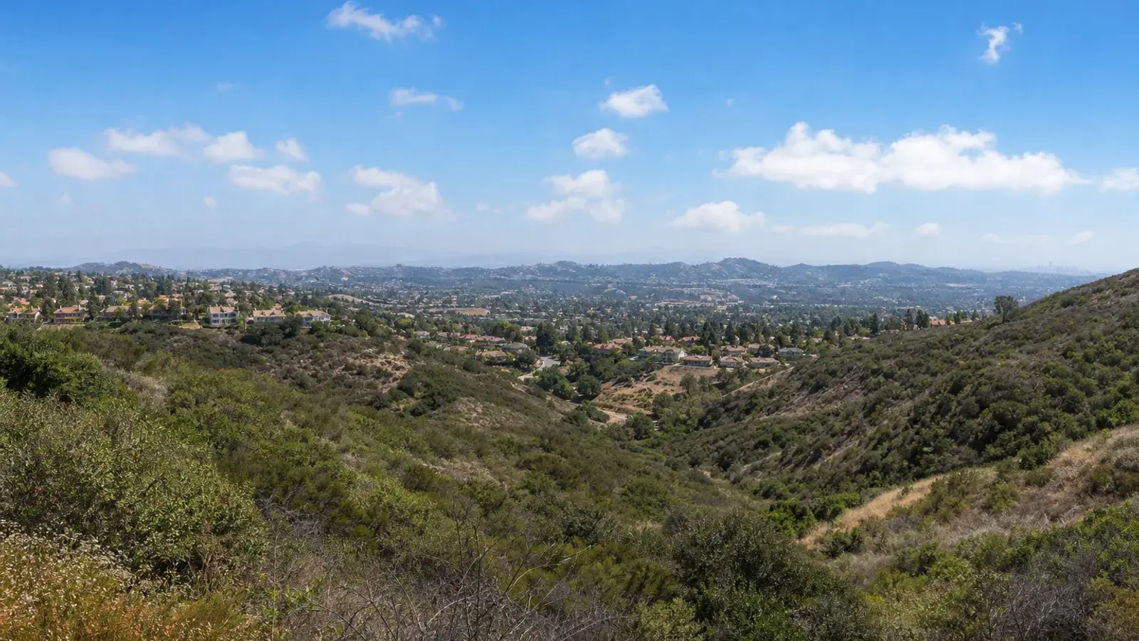 Anaheim Hills open vista toward suburban ridgelines — tummy tuck wellness Anaheim Hills open vista toward suburban ridgelines — tummy tuck wellness | SurgiSculpt®