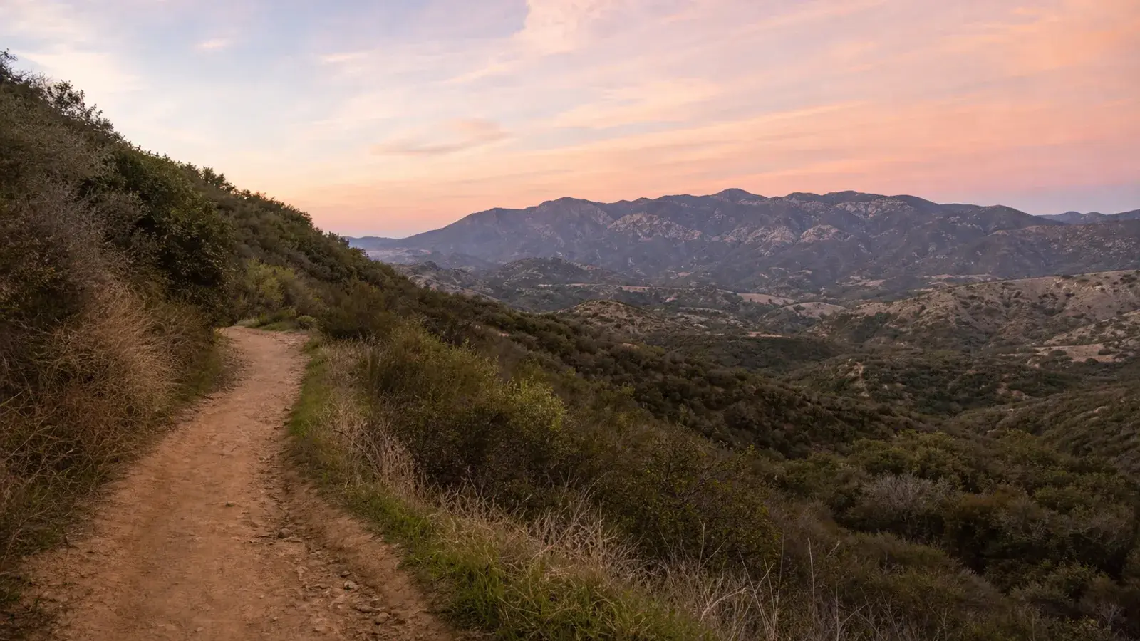 Encino hillside trail at dawn with mountain views — gynecomastia lifestyle Encino hillside trail at dawn with mountain views — gynecomastia lifestyle | SurgiSculpt®