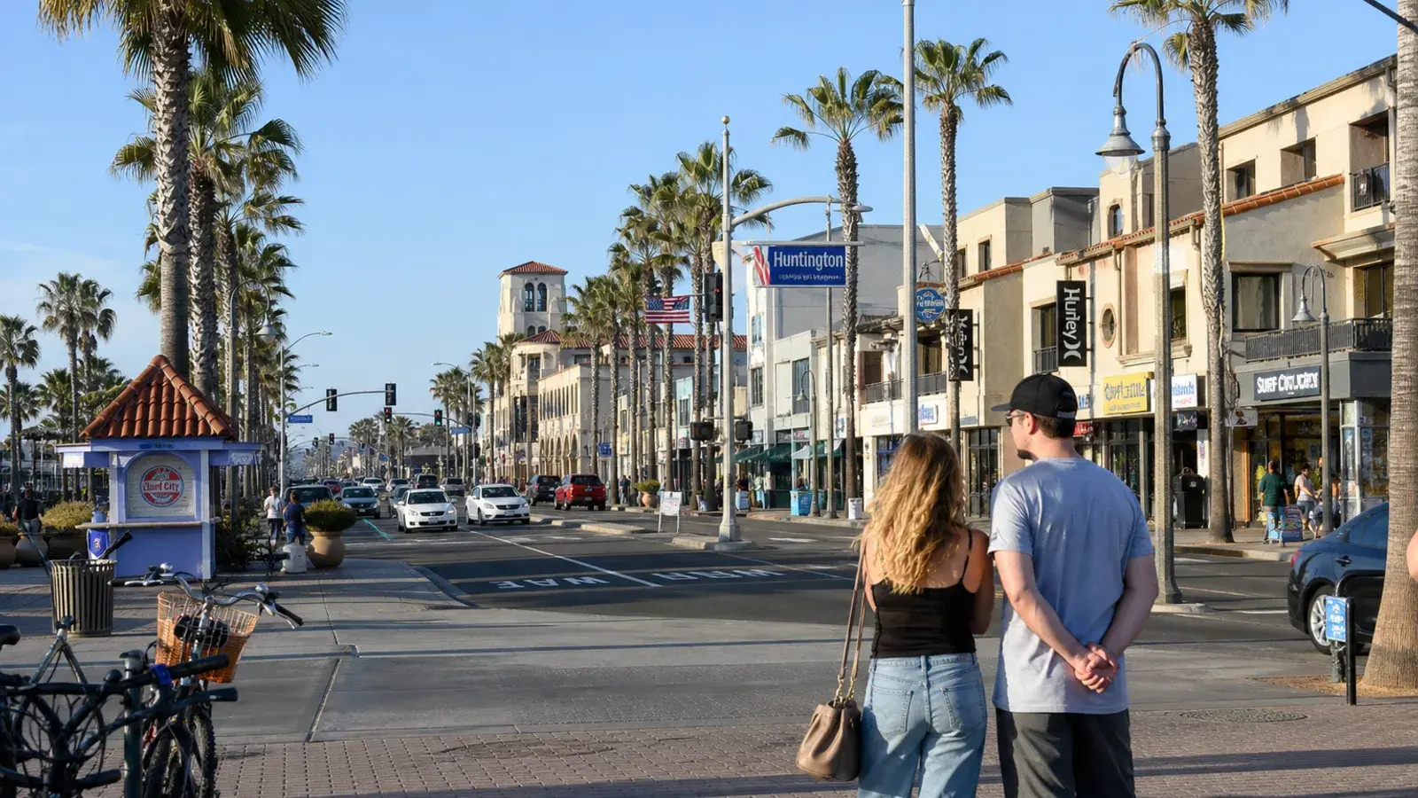 Palm-lined Huntington Beach outdoor street near Main Street — discreet gynecomastia logistics Palm-lined Huntington Beach outdoor street near Main Street — discreet gynecomastia logistics | SurgiSculpt®