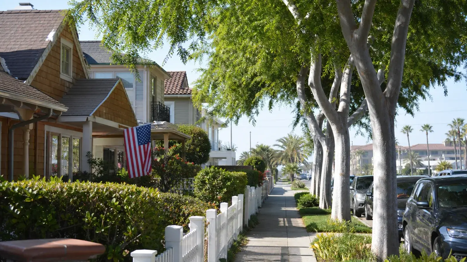 Leafy Huntington Beach neighborhood sidewalk near the coast — mommy makeover context Leafy Huntington Beach neighborhood sidewalk near the coast — mommy makeover context | SurgiSculpt®