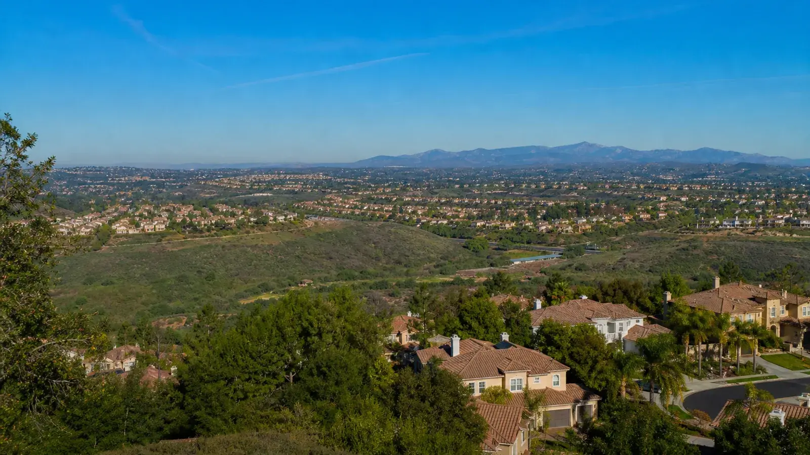 Irvine hillside village overlook with clean suburban vistas — breast augmentation context Irvine hillside village overlook with clean suburban vistas — breast augmentation context | SurgiSculpt®
