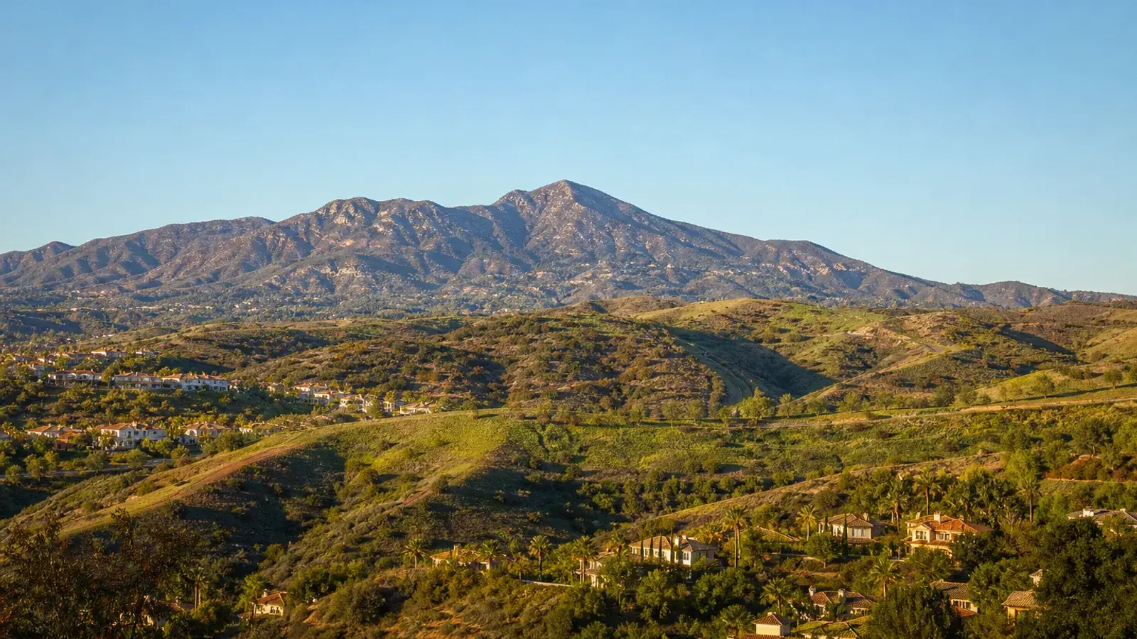 Saddleback mountain view over Mission Viejo master-planned hills — HD Liposuction context Saddleback mountain view over Mission Viejo master-planned hills — HD Liposuction context | SurgiSculpt®