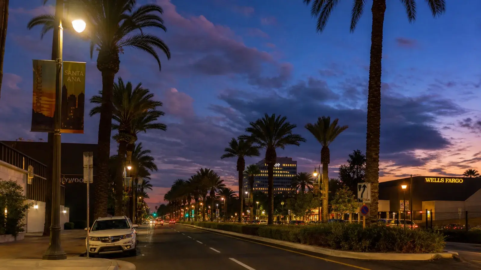 Santa Ana evening civic glow over palm boulevards — mommy makeover mood Santa Ana evening civic glow over palm boulevards — mommy makeover mood | SurgiSculpt®