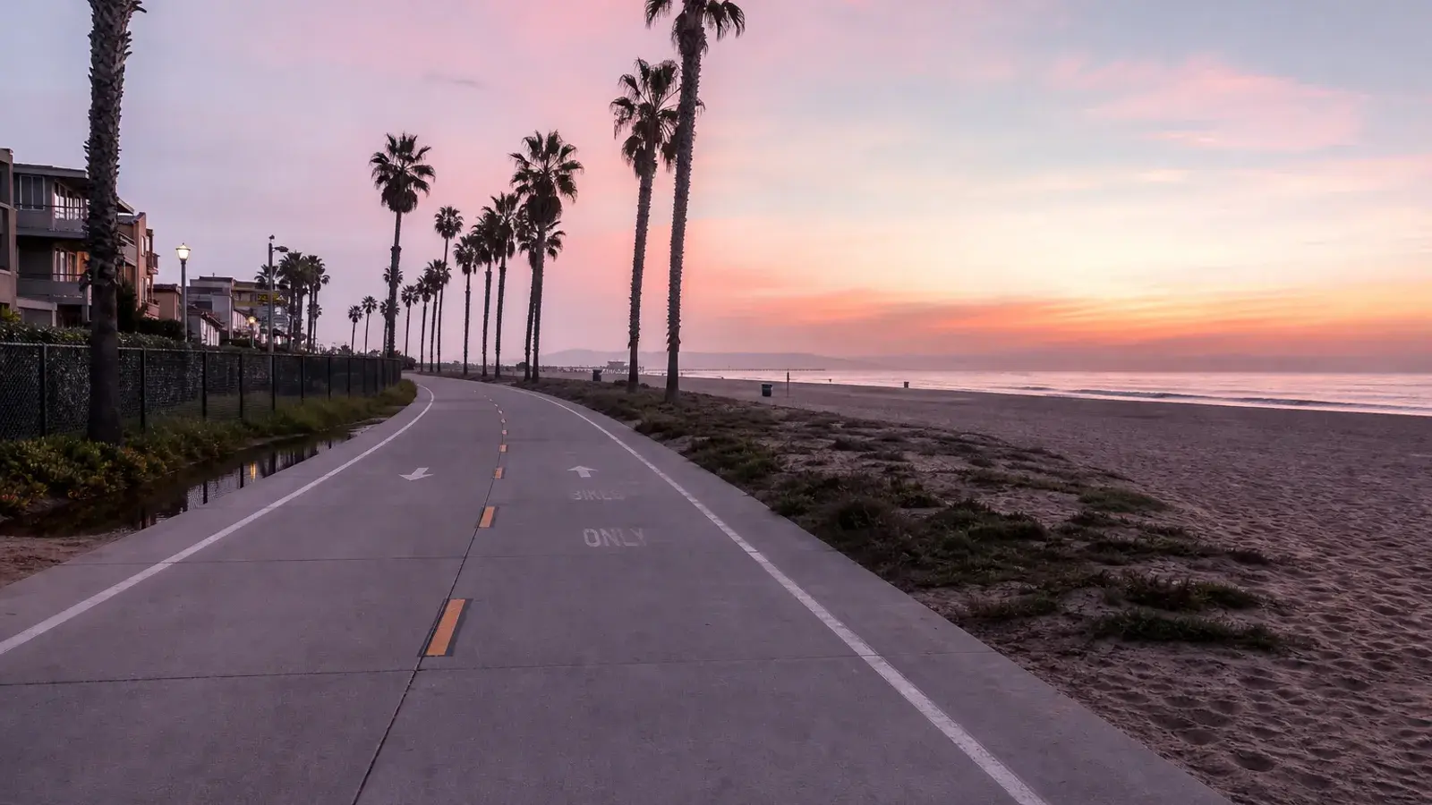 Santa Monica beach path at dawn — gynecomastia lifestyle fitness context Santa Monica beach path at dawn — gynecomastia lifestyle fitness context | SurgiSculpt®