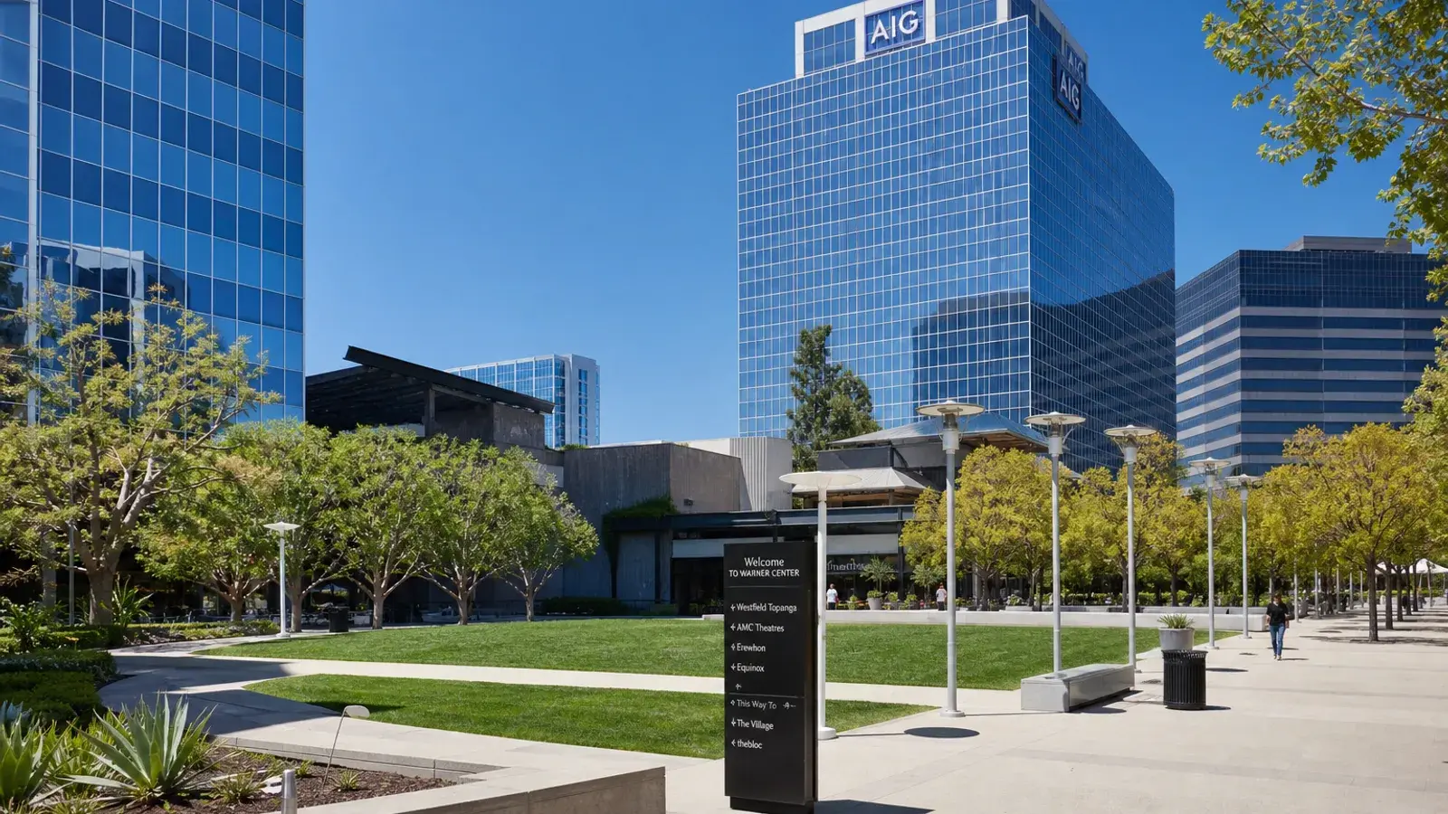 Warner Center outdoor plaza architecture Woodland Hills midday — breast augmentation lifestyle Warner Center outdoor plaza architecture Woodland Hills midday — breast augmentation lifestyle | SurgiSculpt®
