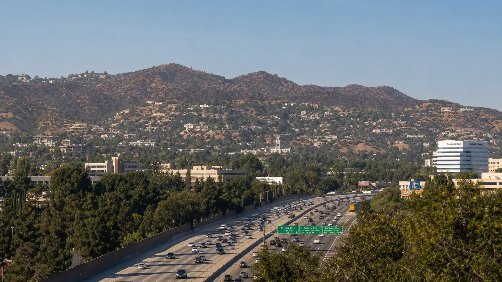 Ventura Freeway corridor view toward Woodland Hills hills — HD Liposuction city context Ventura Freeway corridor view toward Woodland Hills hills — HD Liposuction city context | SurgiSculpt®