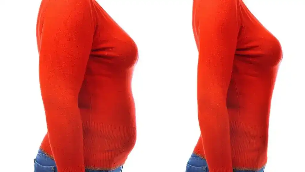 A woman wearing a red sweater in her before and after tummy tuck photos.